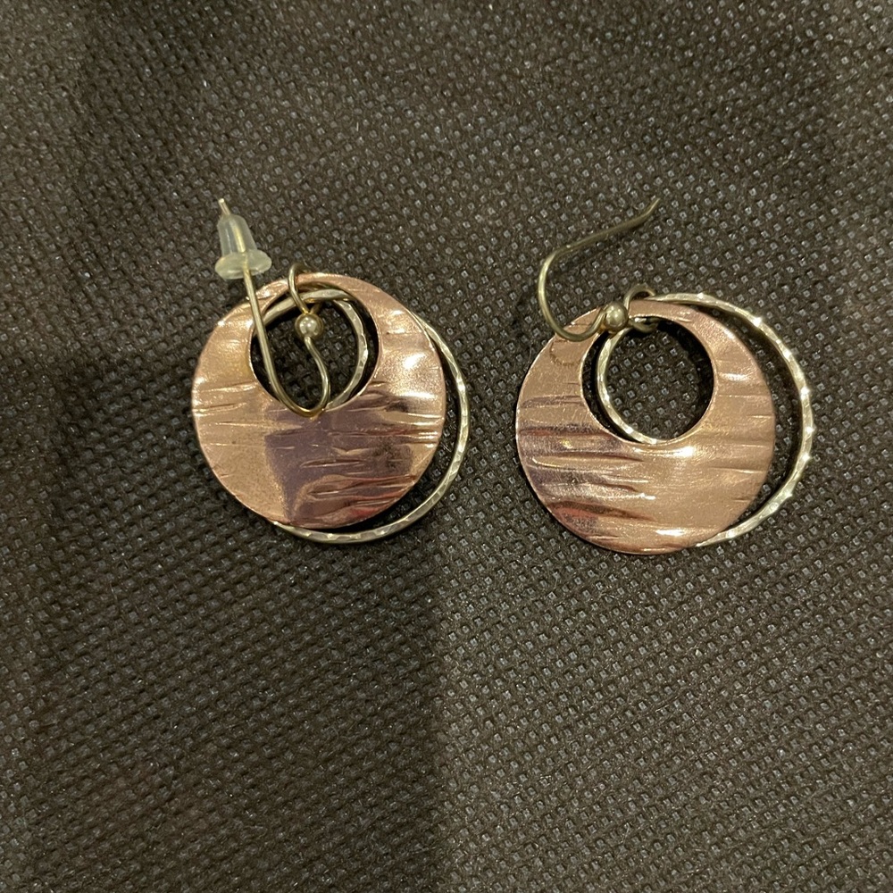 Rose gold double hoops; so in right now.